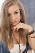 Photo: Portrait of young woman with long hair Portrait of young woman with long hair