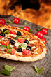 Delicious italian pizza served on wooden table