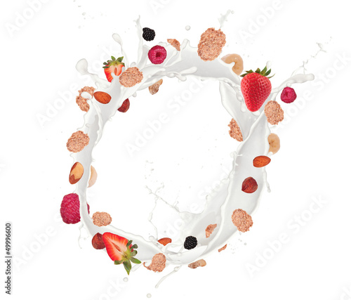 Photo: Healthy food and milk with flying cereals and fruit on white Healthy food and milk with flying cereals and fruit on white