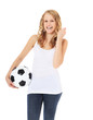 Attraktives Mädchen hält Fußball