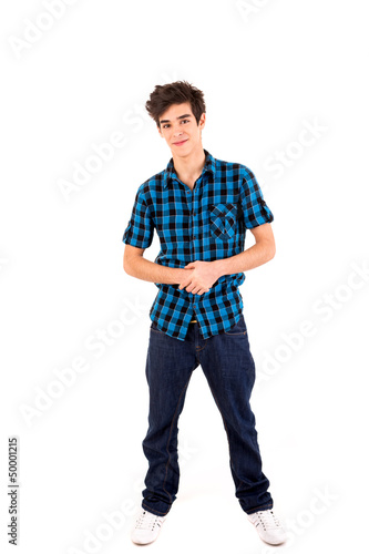 Photo: Studio picture of a young and handsome man posing Studio picture of a young and handsome man posing