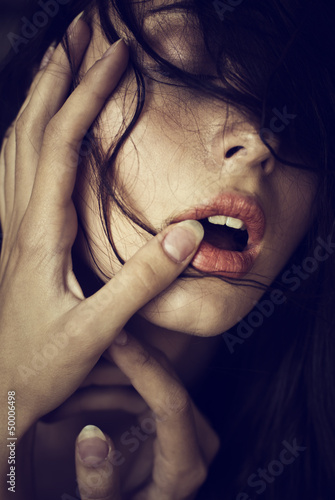 Photo: glamor portrait of a beautiful young woman. close-up shot glamor portrait of a beautiful young woman. close-up shot