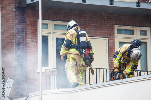 Photo: Equipped firefighters Equipped firefighters