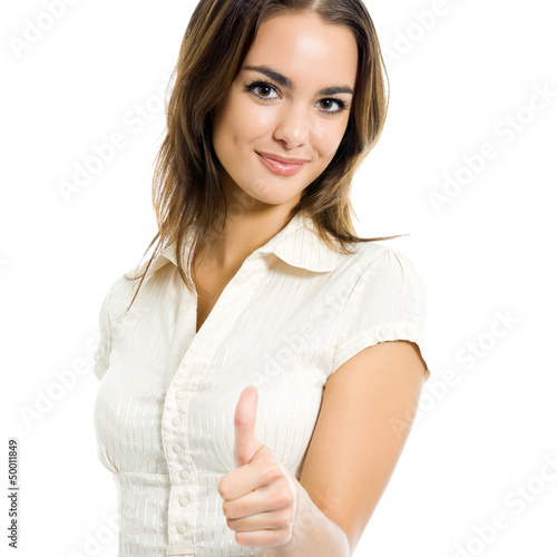 Photo: Businesswoman showing thumbs up gesture, isolated Businesswoman showing thumbs up gesture, isolated