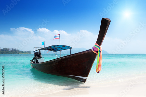 Photo: long boat at island in Thailand long boat at island in Thailand