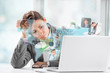 Photo: Business woman surfing on web with modern laptop Business woman surfing on web with modern laptop