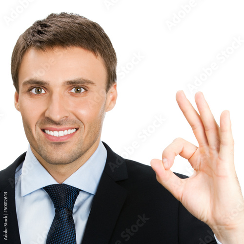 Photo: Businessman with okay gesture, isolated Businessman with okay gesture, isolated