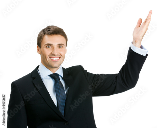 Photo: Business man showing, isolated Business man showing, isolated