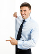 Photo: Businessman showing signboard, on white Businessman showing signboard, on white