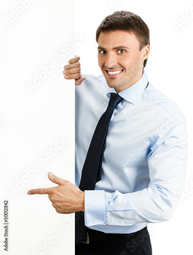 Photo: Businessman showing signboard, on white Businessman showing signboard, on white