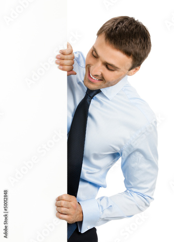 Photo: Businessman showing signboard, on white Businessman showing signboard, on white