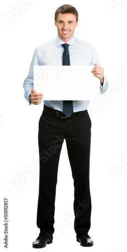Photo: Businessman showing blank signboard, isolated Businessman showing blank signboard, isolated