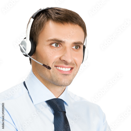 Photo: Phone operator in headset, isolated Phone operator in headset, isolated