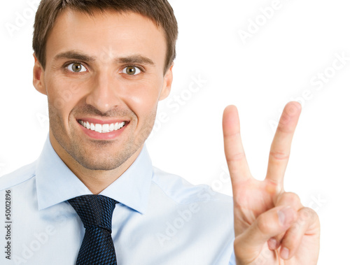 Photo: Businessman showing two fingers or victory sign Businessman showing two fingers or victory sign