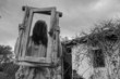 Horror Scene of a scary girl over a spooky  house background