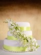Photo: Traditional wedding cake with orchid flowers Traditional wedding cake with orchid flowers