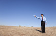 Photo: Businessman aiming a handgun Businessman aiming a handgun
