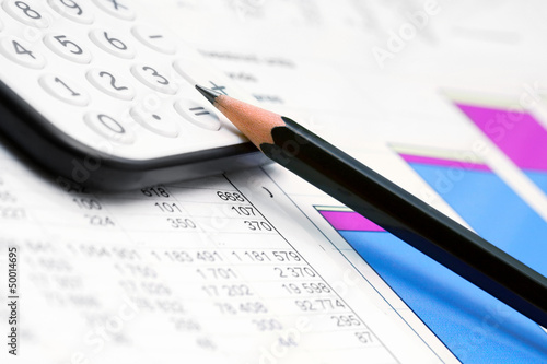 Photo: Financial graphs and charts analysis Financial graphs and charts analysis