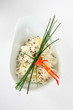 rice with chives and chili in a bowl
