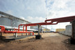 Photo: red tube and the construction of an oil Deposit red tube and the construction of an oil Deposit