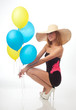Beautiful woman with balloons