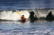 Kayak surfer in action