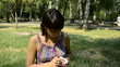 young pregnant woman takes the pill