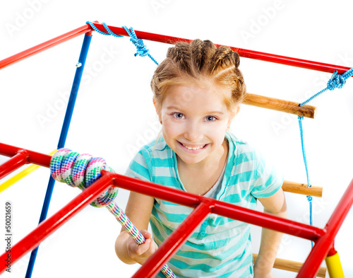 Photo: Little girl on a playground Little girl on a playground