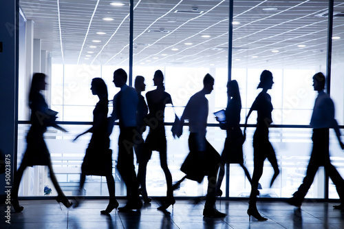 Photo: silhouettes of businesspeople silhouettes of businesspeople