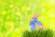 Osterhase mit blauer Schleife - Bokeh