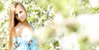 beautiful brunette woman in the park on a warm spring day