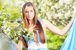 beautiful blonde in a spring garden