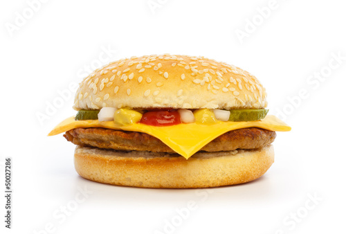 Photo: Hamburger with cheese, pickles, onion and sauce Hamburger with cheese, pickles, onion and sauce