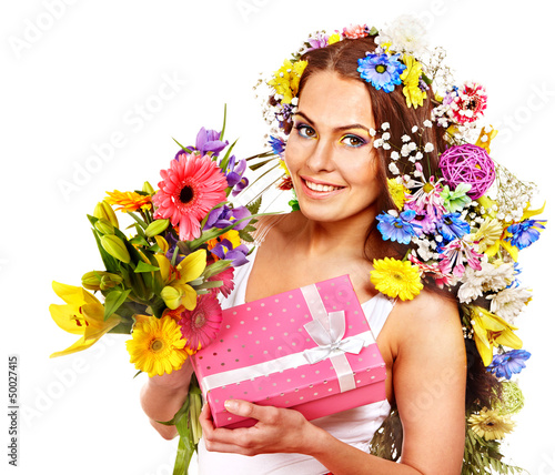 Photo: Woman with gift box and flower. Woman with gift box and flower.