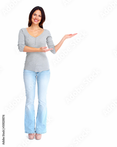 Photo: Happy woman showing a copyspace. Happy woman showing a copyspace.