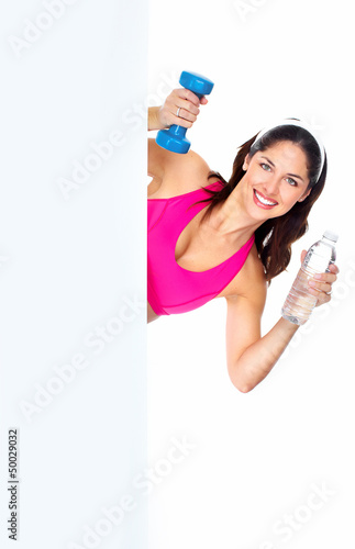 Photo: Young beautiful fitness woman. Young beautiful fitness woman.
