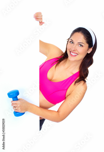 Photo: Young beautiful fitness woman. Young beautiful fitness woman.