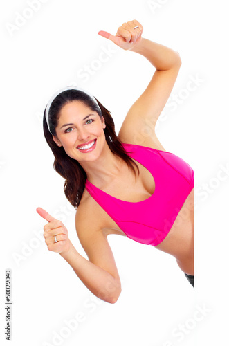 Photo: Young beautiful fitness woman with banner. Young beautiful fitness woman with banner.