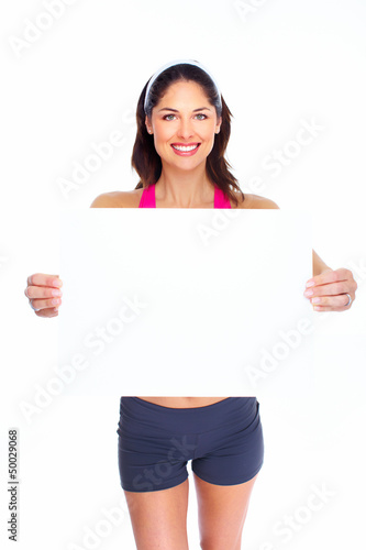 Photo: Young beautiful fitness woman. Young beautiful fitness woman.
