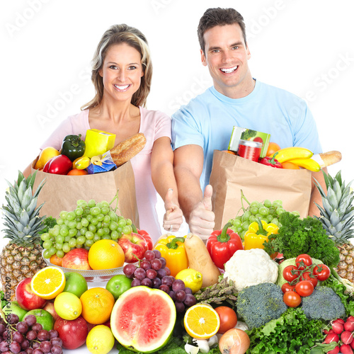 Photo: Happy couple with fruits. Happy couple with fruits.