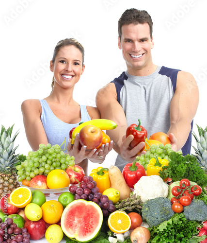 Photo: Happy couple with fruits. Happy couple with fruits.