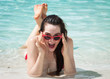Surprised happy woman on beach