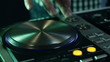 DJ using his mixer table