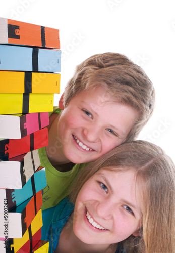 Photo: Mädchen und Junge mit Büchern Mädchen und Junge mit Büchern