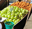 Boat selling food at Damnoen Saduak Floating arket in Thailand