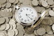 Watch on coins background