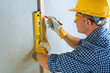 a contractor do layering on concrete wall