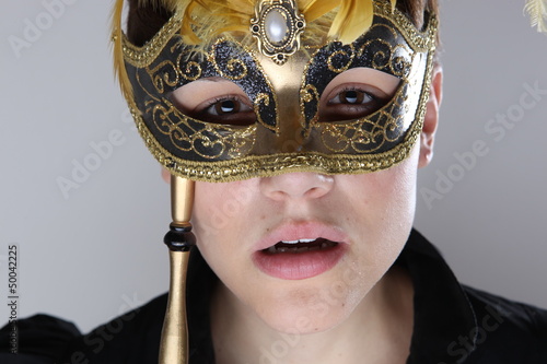 Photo: elegant girl with a wonderful mask elegant girl with a wonderful mask