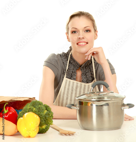 Photo: Woman in apron with grocery bag , isolated on white background Woman in apron with grocery bag , isolated on white background