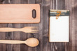Old Recipe notebook, kitchen plank, spoon, fork on wood
